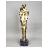 Mid-century Modernist brass sculpture on a