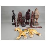 Group of vintage carved wood figurines and