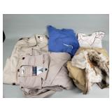 Box of trench coat, sweater, and vests