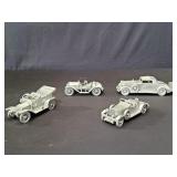 Four Danbury Mint pewter models 1931 Stutz