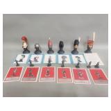 Group of miniature recreation pewter helmets and