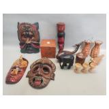 Box of carved wood masks,figurines and pepper