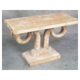 Rustic classical-style stand with carved wood ram
