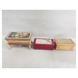 Three vintage musical jewelry boxes