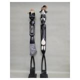 Pair of carved wood tribal style statues