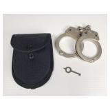 Vintage Smith & Wesson M-100 handcuffs with key