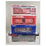 Three Lionel freight cars & one industrial car