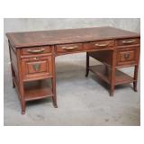 Art Nouveau oak writing desk with leather top,