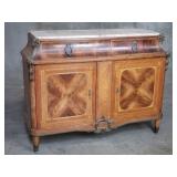 Antique French walnut and inlaid with brass ram