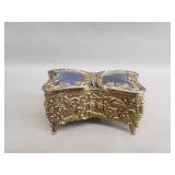 Vintage brass butterfly music box