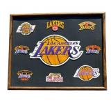 Framed vintage Lakers patches