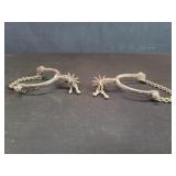 Vintage iron spurs with chains