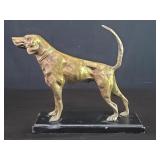 Brass hunting dog sculpture mounted on a wood base