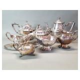 Group of silver plate items, teapots, cream and