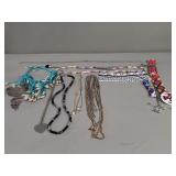 Costume jewelry necklaces, bracelets,  etc.