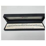 Diamond and blue topaz bracelet, tested positive