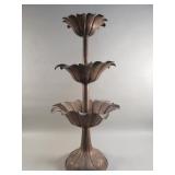 Vintage Hollywood Regency-style tiered copper