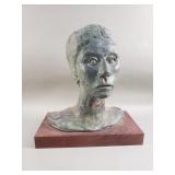 L. Simons terracotta sculpture on wood base