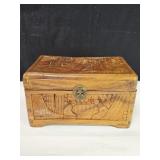 Vintage Chinese carved camphor wood chest with a