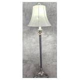 Vintage brass tripod floor lamp with claw feet