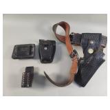 Group of vintage leather holsters and belt