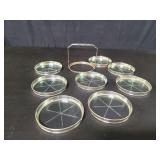 Eight sterling silver and glass coasters with