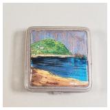 Vintage compact featuring a hand-painted scene