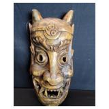 Carved wood Oni wall wask