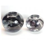 Pair of Kosta Boda sphere candleholders