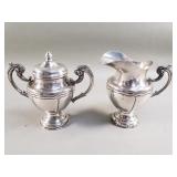 Pair of vintage sterling silver cream and sugar