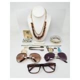 Group of costume jewelry, rosary, glasses, ring