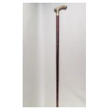 Vintage brass and wood cane with flask
