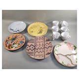 Group of pottery and porcelain cups and plates