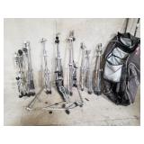 Miken bag with assorted drum stands and drum pedal