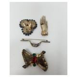 4 sterling silver brooches with multi colored