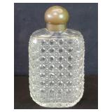 Antique crystal flask with brass screw cap