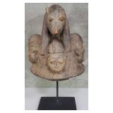 African carved wood sculpture on metal base