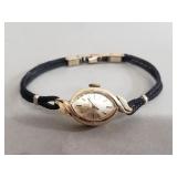 14k gold Omega womenï¿½s wristwatch