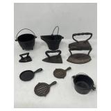 Group of vintage cast iron miniature sad iron,
