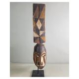 African carved wood Bobo plant mask on metal