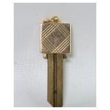 14k gold and brass key pendant
