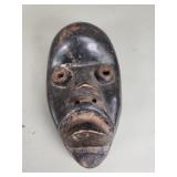Vintage African carved wood mask