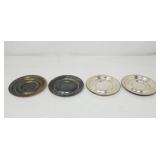 Four sterling silver saucers
