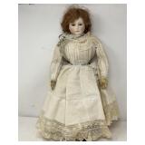 Vintage porcelain head doll