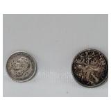 Pair of foreign silver coins