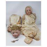 Pair of vintage/antique porcelain head dolls,
