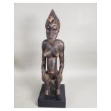 Vintage African carved wood fertility figurine