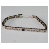 14k gold bracelet adorned with diamonds and