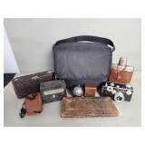 Group of vintage cameras and accessories, flask,