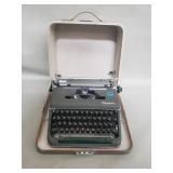 Vintage Olympia typewriter with hard case